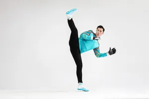 Action shot du maillot de gardien à manches longues et pantalon de foot technique