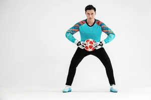 Professional black quick-dry soccer goalkeeper training pants with studio lighting