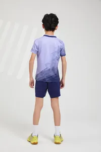 Back view of a boys professional purple gradient sports jersey set for badminton.