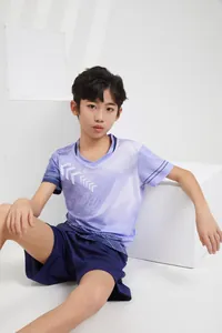 Detailed view of kids purple gradient sports jersey set for badminton and tennis competitions