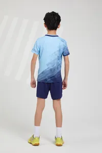 Back view of breathable kids blue sports uniform t-shirt and shorts set for badminton and tennis