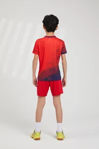 Back view of children's red and blue sports jersey set for badminton and tennis matches