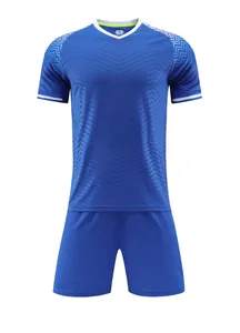 Detailed view of a professional blue soccer training kit with V-neck and chevron patterns.