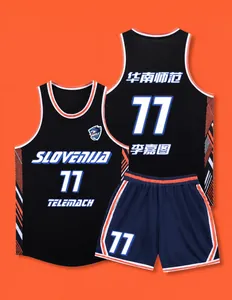 Detailed view of a black and navy blue basketball jersey set with stylish orange trim accents.