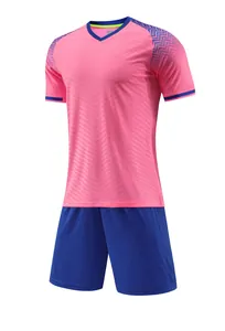Full front view of a pink soccer training jersey set with matching blue shorts