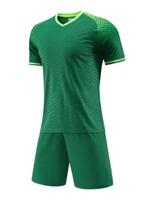 Detailed view of breathable green soccer jersey set with subtle diagonal pattern