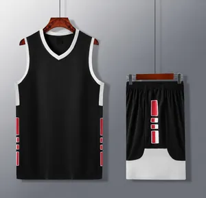 Close-up detail of high-quality black basketball jersey and shorts set with red accents