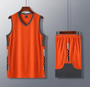 Close-up detail of the orange basketball jersey set with grey contrast side panels