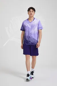 Full body display of the professional purple badminton uniform on an Asian model