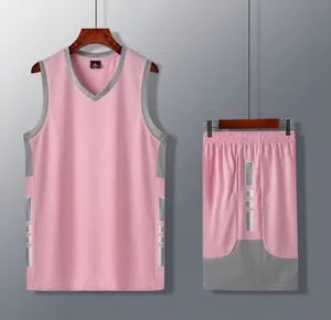Detail of pink basketball jersey set featuring a sleeveless top and matching shorts.