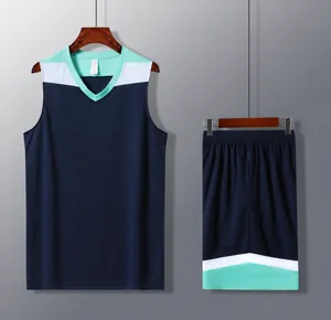 Detail view of navy blue basketball uniform set with teal and white color block