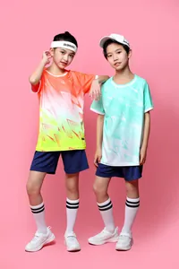 Vibrant kids football jersey set featuring orange and mint green gradient sporty designs