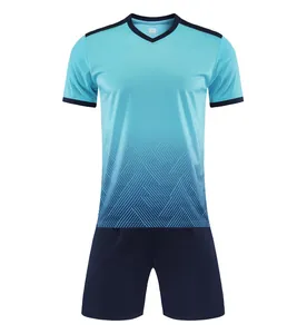 Detailed front view of a high-quality blue gradient soccer jersey and navy shorts set