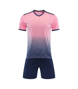Detailed view of pink and navy gradient soccer jersey set for men and boys training