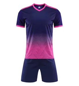 Two-piece soccer uniform set with blue and pink gradient and geometric patterns