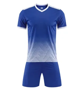 Blue soccer jersey and shorts set featuring a white geometric gradient pattern and V-neck.