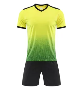 Detailed view of yellow and green gradient soccer jersey set for kids and men with shorts