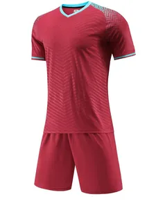Red soccer jersey and shorts training set with geometric pattern and blue V-neck
