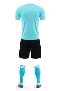 Professional back view of light blue soccer training uniform set with black shorts and socks.
