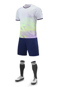 Complete adult soccer uniform set with gradient patterned jersey and navy blue shorts