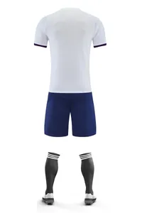 Professional white and navy soccer uniform set including jersey shorts and socks