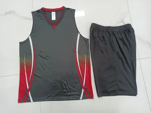 Detailed view of the dark grey sleeveless basketball jersey set with red accents