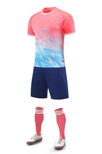 Professional soccer uniform set with pink gradient jersey and dark blue shorts