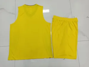Detailed rear view of vibrant yellow sleeveless basketball jersey and matching sports shorts set