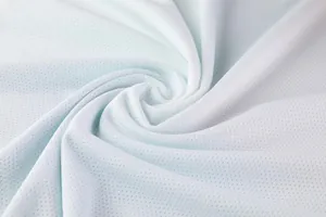 Close-up of breathable white mesh fabric for sports training jerseys