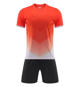 Orange and white gradient soccer jersey set with black shorts for training