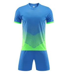 Blue and neon green men's football kit with geometric V-pattern and size XL label