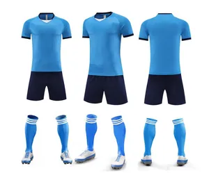 Detailed view of blue soccer uniform set including jersey, shorts, socks, and shoes.