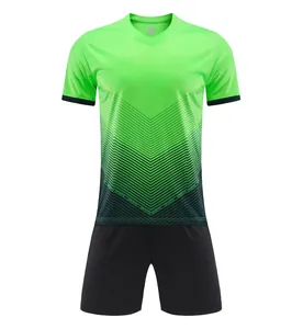 Detailed view of neon green and black soccer uniform jersey with chevron pattern.
