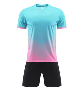 Detail view of sky blue and pink gradient soccer jersey set with black shorts