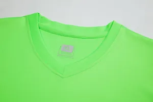 Close-up of neon green football jersey neckline showing the XL sportswear size label