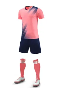 Full pink and navy soccer uniform set including jersey, shorts, and socks.