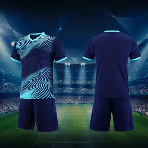 Detailed view of navy soccer jersey set with cyan wave patterns on stadium background