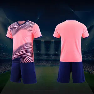 Pink and navy blue soccer jersey set with wavy pattern for sports training and matches