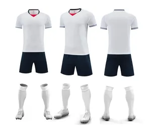 Professional soccer jersey set with white jersey and navy shorts seen from multiple angles