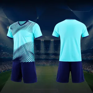 Front and back view of teal soccer uniform set with wave pattern design