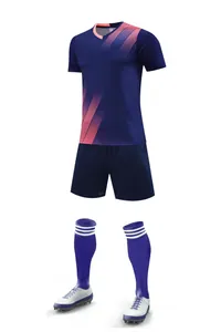 Professional navy blue soccer training kit including jersey, shorts, and matching socks.