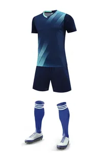 Professional navy blue soccer training kit with jersey, shorts, socks, and cleats