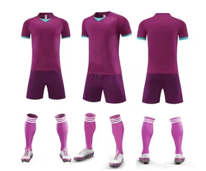 Multi-angle view of purple soccer uniform set including jersey, shorts, and socks.