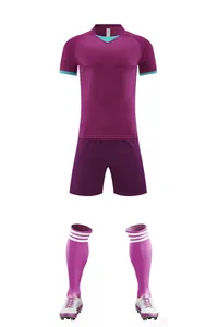 Full purple soccer uniform set including jersey, shorts, socks, and cleats for training