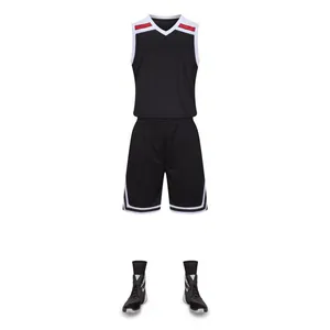 Detail view of breathable black basketball jersey and shorts set with matching shoes.