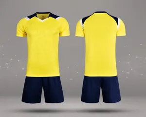 Front and back view of a yellow quick-dry soccer jersey and navy blue shorts set