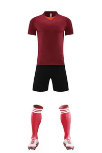 Professional full soccer uniform set with maroon jersey, black shorts, red socks and cleats