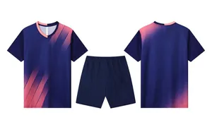 Detailed view of navy blue soccer jersey set featuring pink gradient graphic patterns.