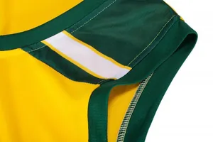 Close-up of breathable mesh basketball jersey neckline with yellow and green contrast stitching.