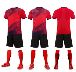 Complete red and black soccer uniform set including jersey shorts socks and shoes